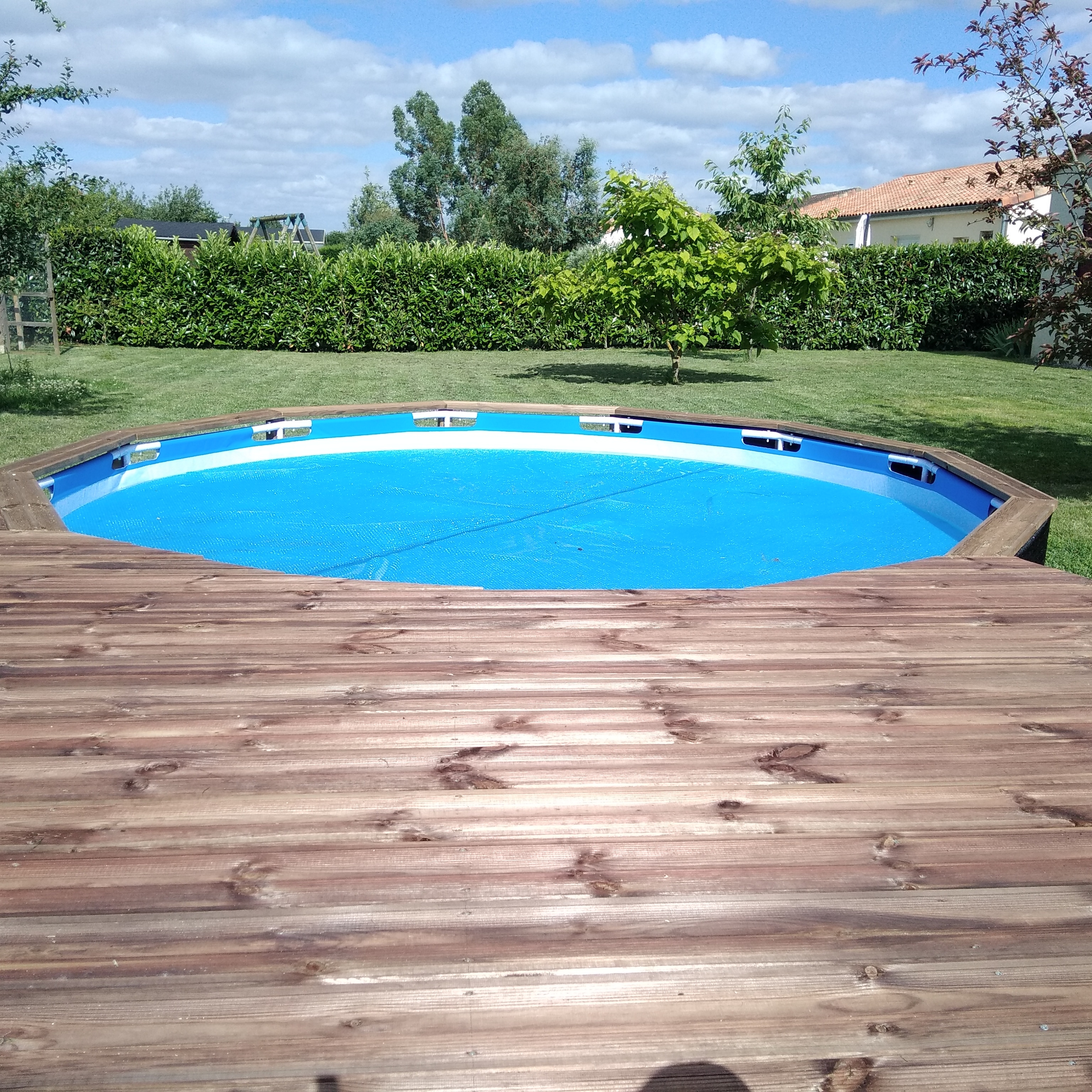piscine tubulaire et terrasse bois